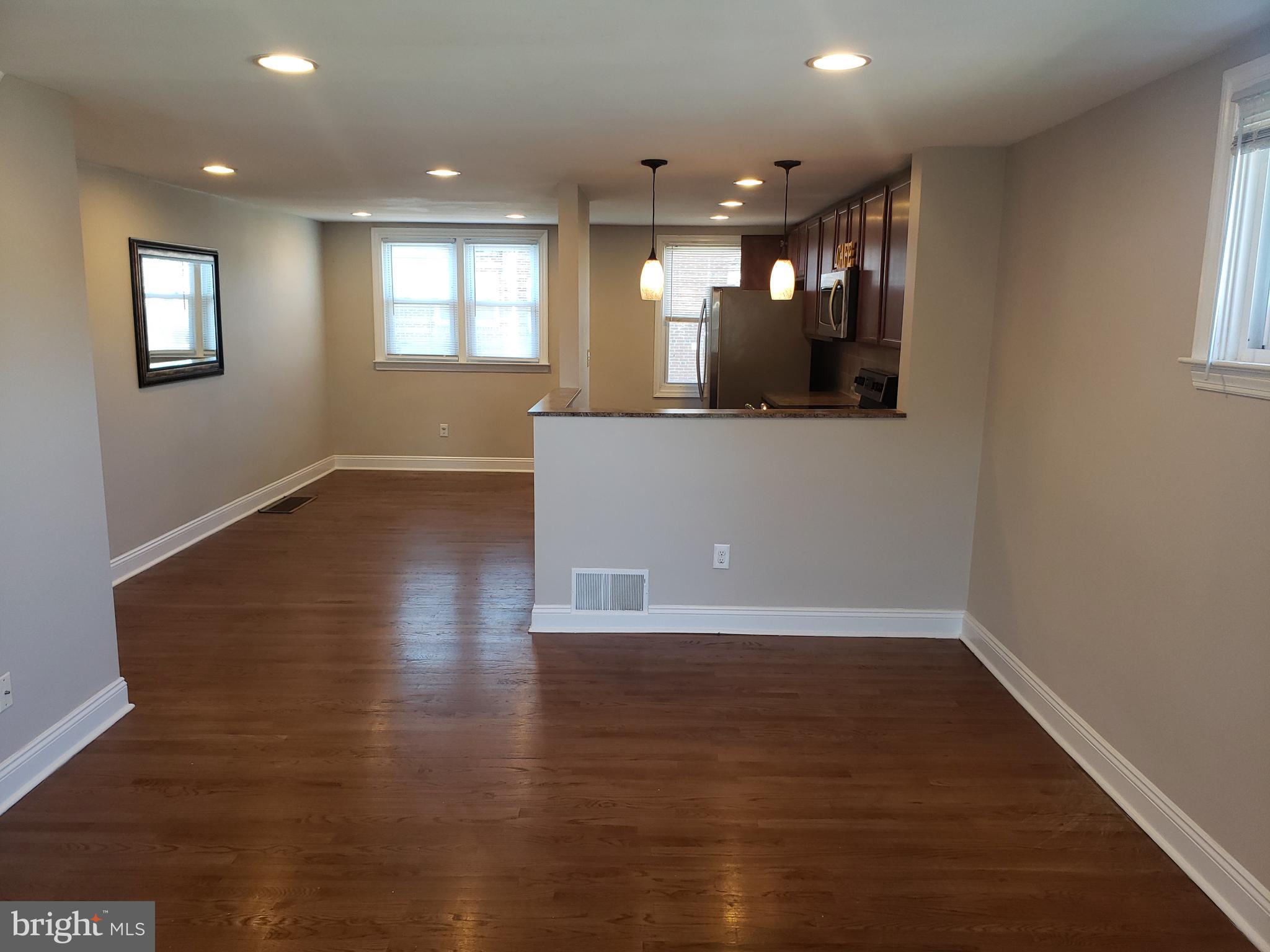 1850 Farrington Road Philadelphia, PA 19151 - Photo 2 of 20 Living and dining room with hardwood floors