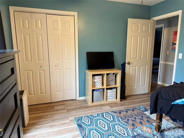 a view of livingroom with furniture and a flat screen tv