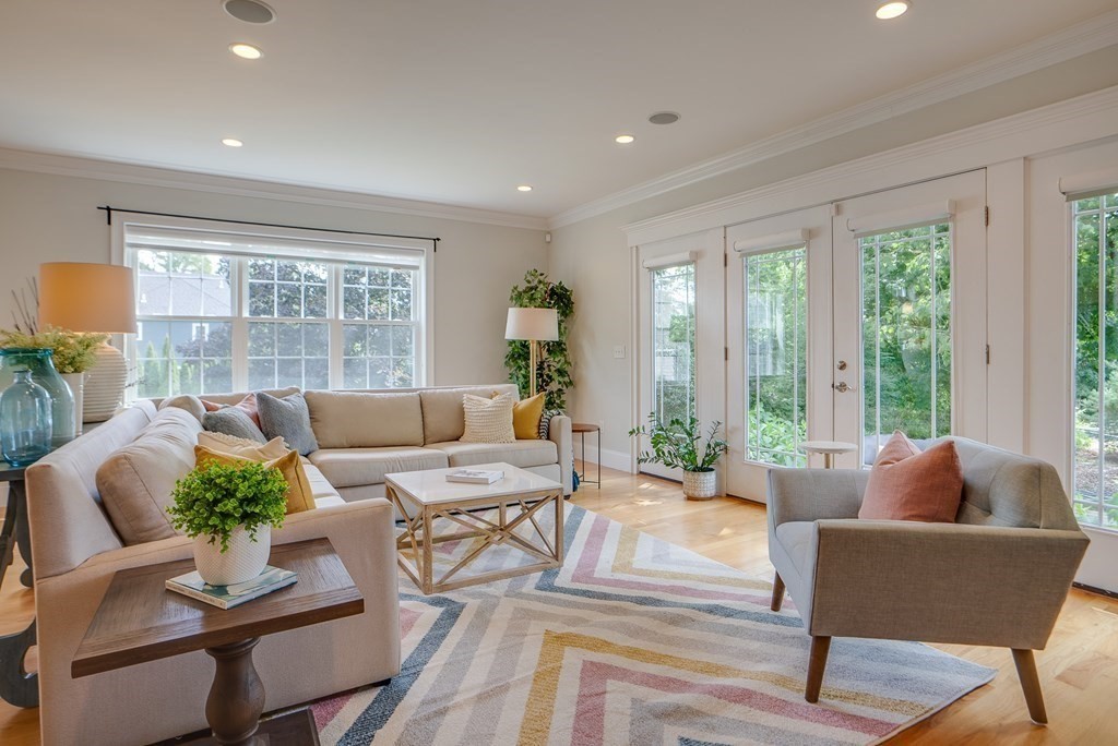 427 Davis Road Bedford, MA 01730 - Photo 13 of 42 a living room with furniture and a large window
