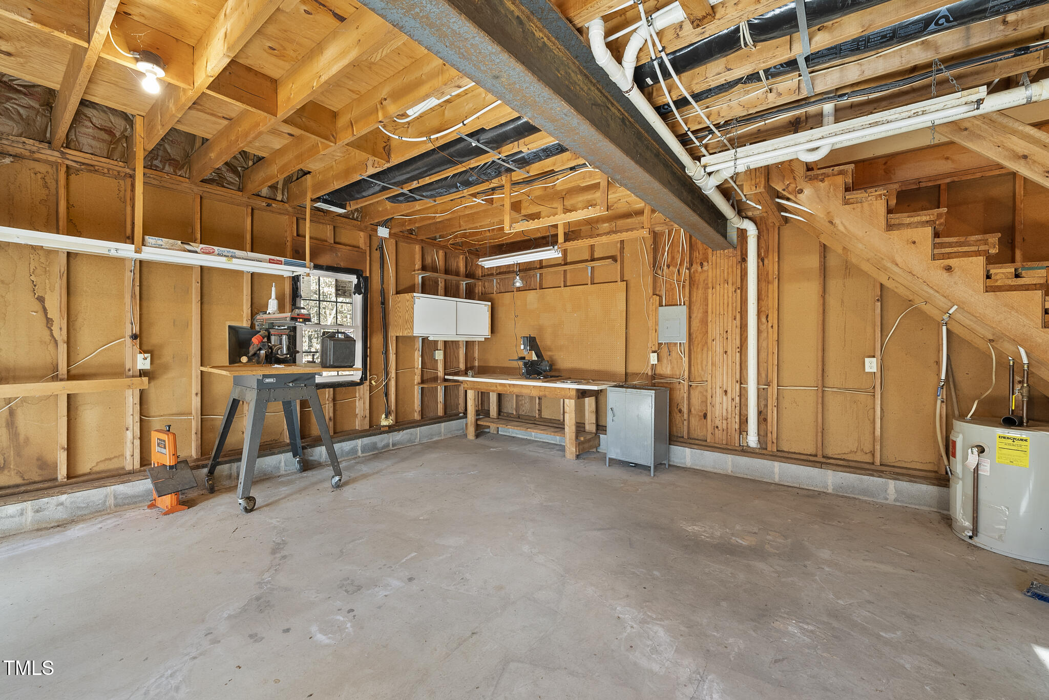 12012 Strickland Road Raleigh, NC 27613 - Photo 39 of 45 a view of a room with wooden walls