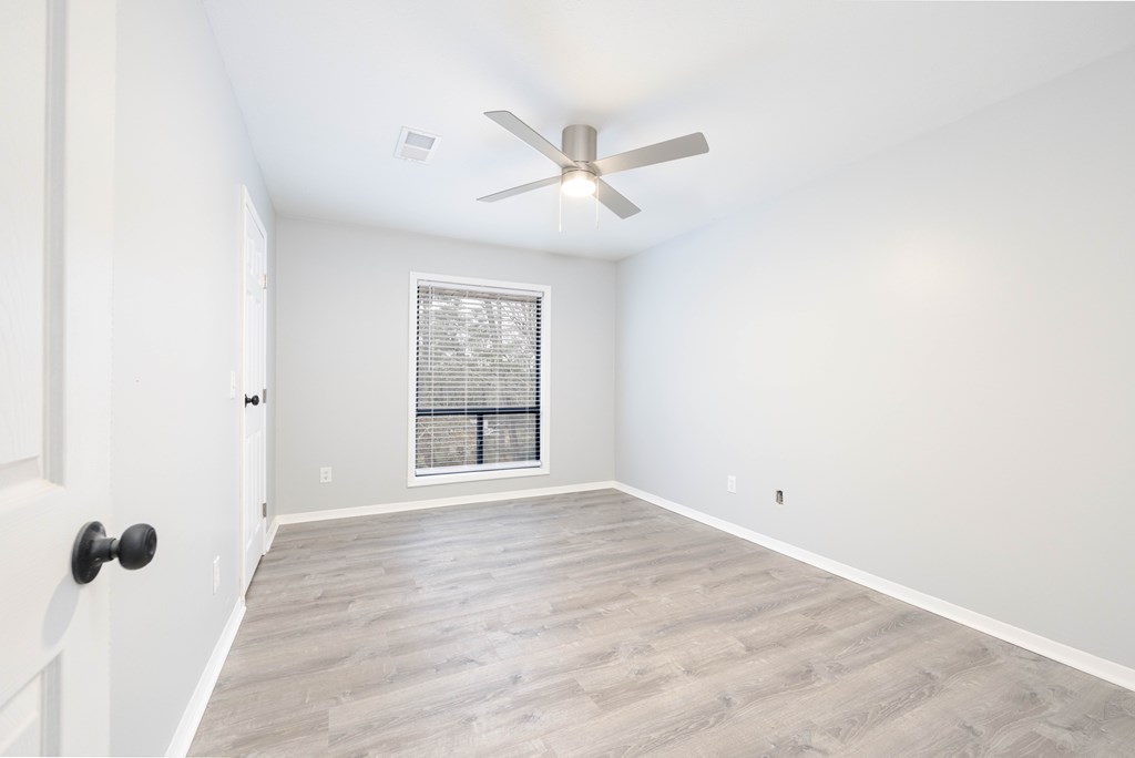 4312 Old Macon Road, Unit 56 Columbus, GA 31907 - Photo 13 of 19 a view of an empty room with a window