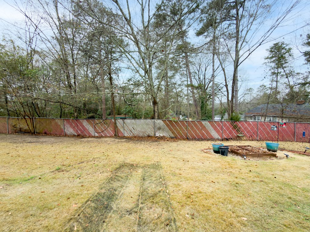4312 Old Macon Road, Unit 56 Columbus, GA 31907 - Photo 19 of 19 a view of a yard with large trees