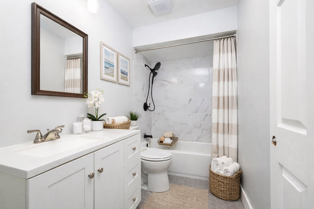 4312 Old Macon Road, Unit 56 Columbus, GA 31907 - Photo 5 of 19 a bathroom with a granite countertop sink toilet and shower