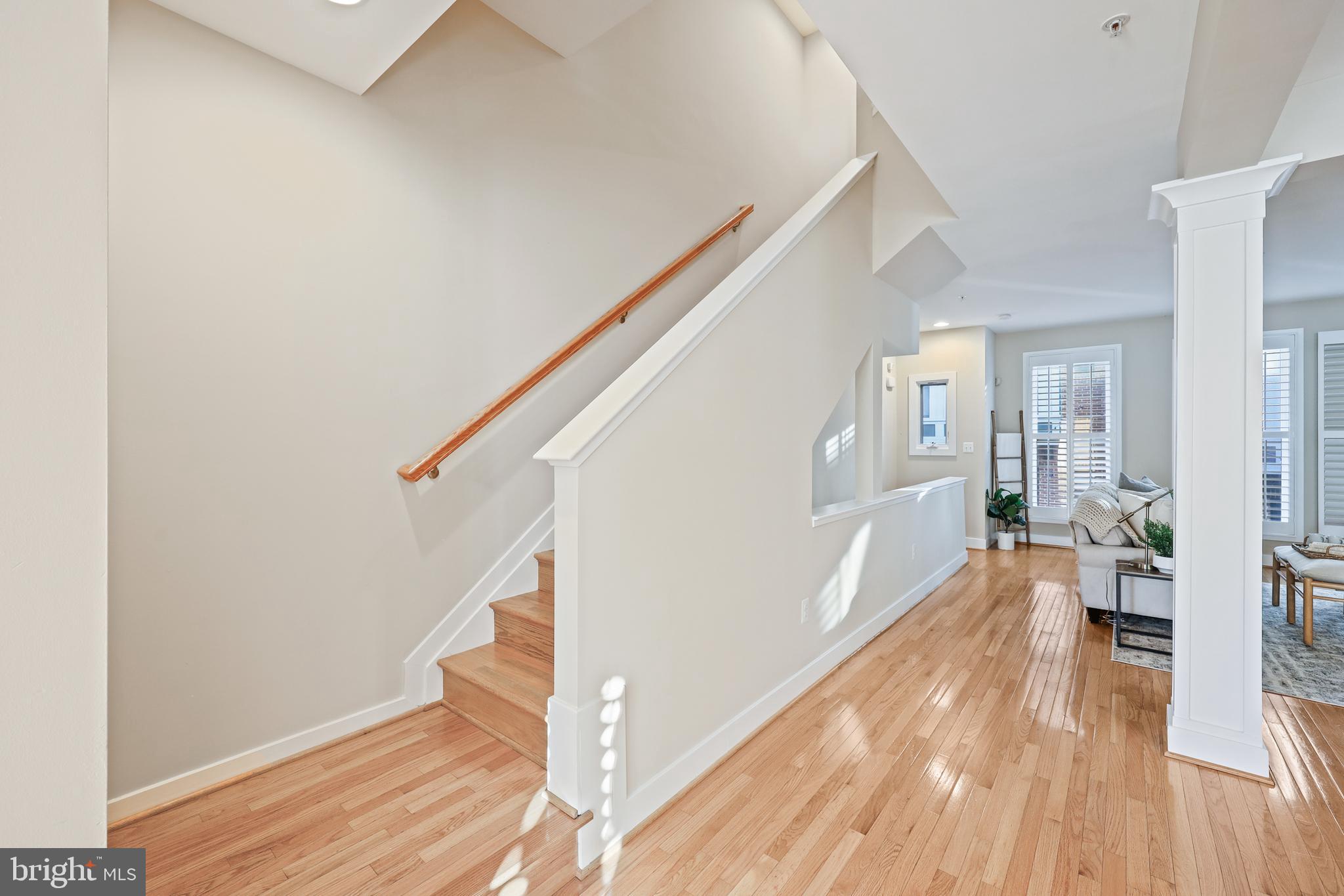21 Yogurt Lane Baltimore, MD 21231 - Photo 21 of 40 Stairway with hardwood flooring