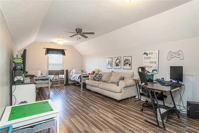 an aerial view of a house with a garden