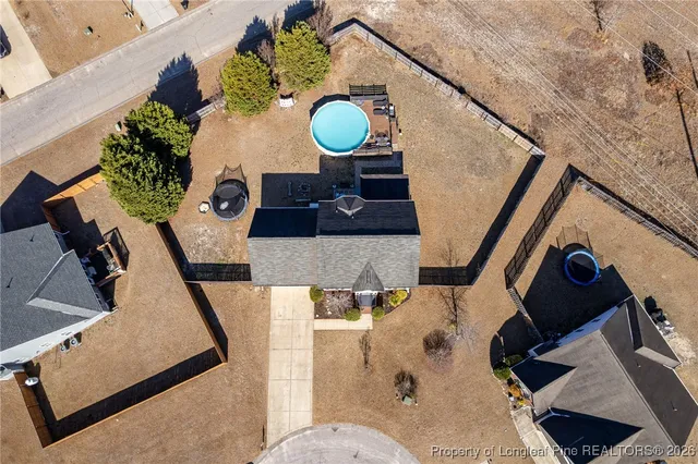 a view of a backyard of the house