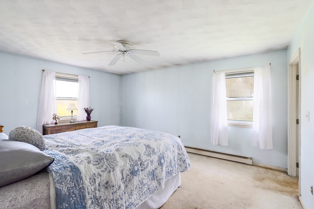 6 Lerner Drive Dudley, MA 01571 - Photo 14 of 22 a bedroom with a bed and a window