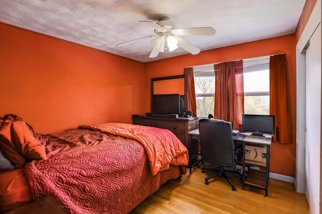 6 Lerner Drive Dudley, MA 01571 - Photo 19 of 22 a bedroom with a bed and a desk