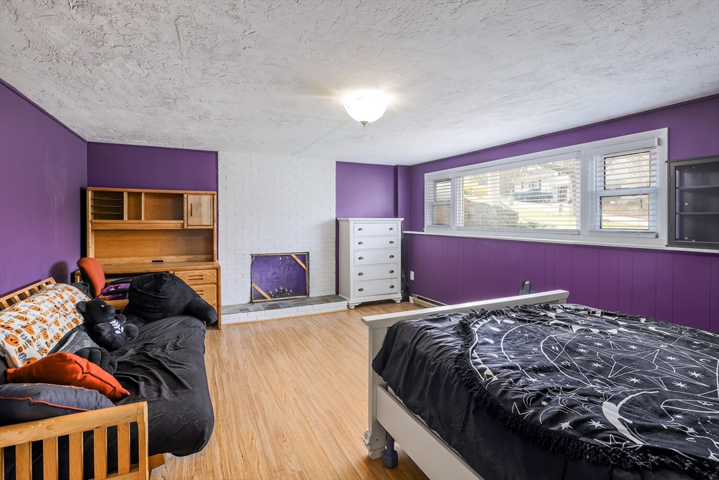 6 Lerner Drive Dudley, MA 01571 - Photo 20 of 22 a bedroom with a bed and window