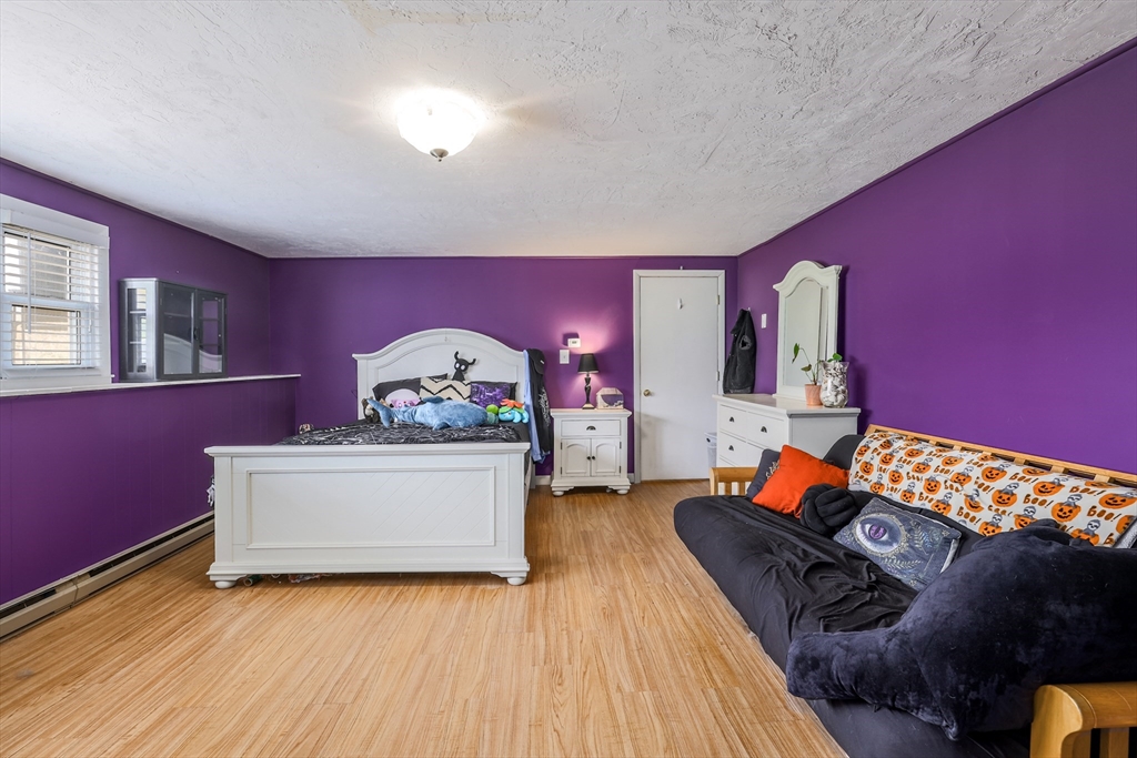 6 Lerner Drive Dudley, MA 01571 - Photo 21 of 22 a living room with furniture rug and wooden floor