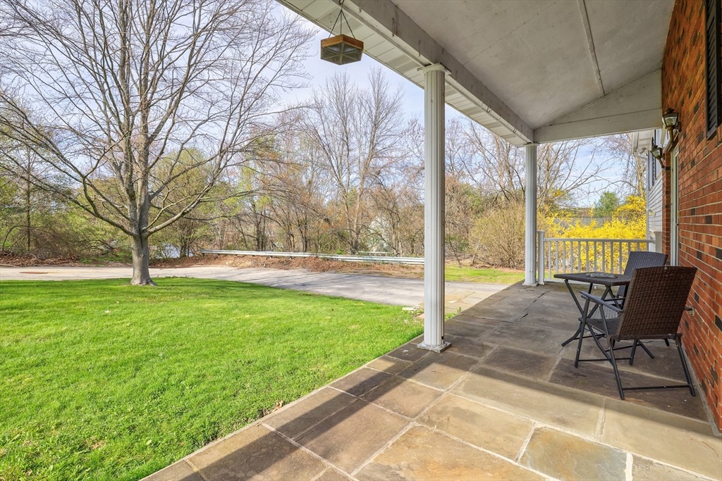 6 Lerner Drive Dudley, MA 01571 - Photo 3 of 22 a view of a swimming pool with a patio