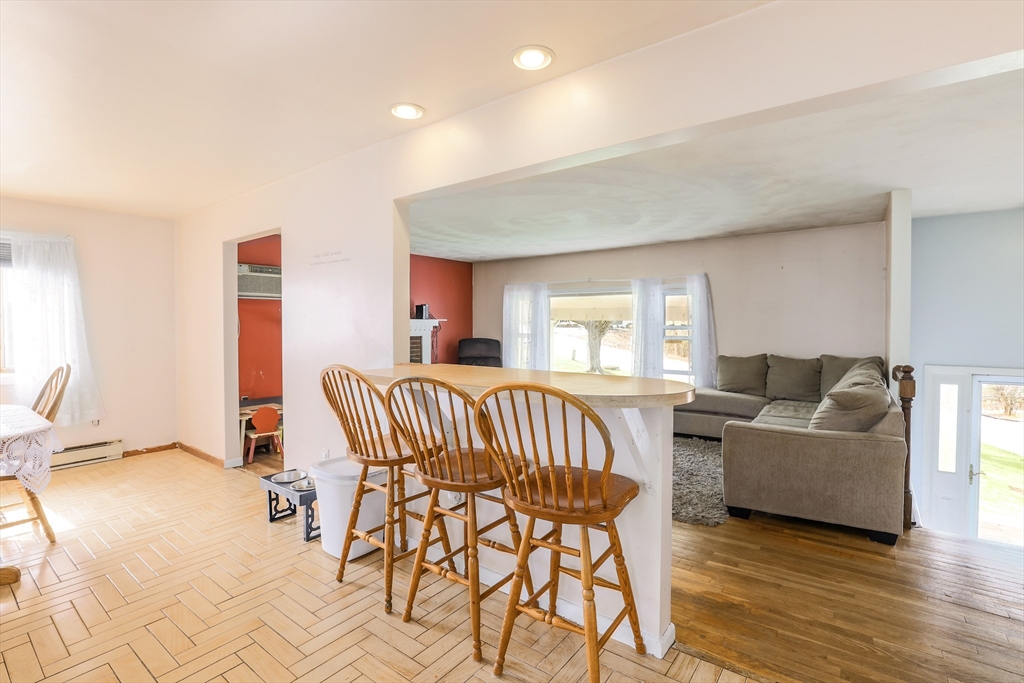 6 Lerner Drive Dudley, MA 01571 - Photo 10 of 22 a living room with furniture and a wooden floor