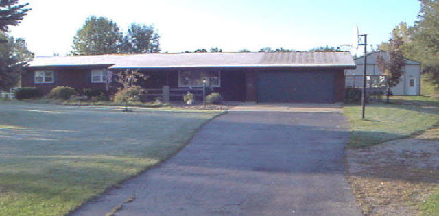6464 Fitzgerald Road Rockford, IL 61102 - Photo 1 of 1 a backyard of a house