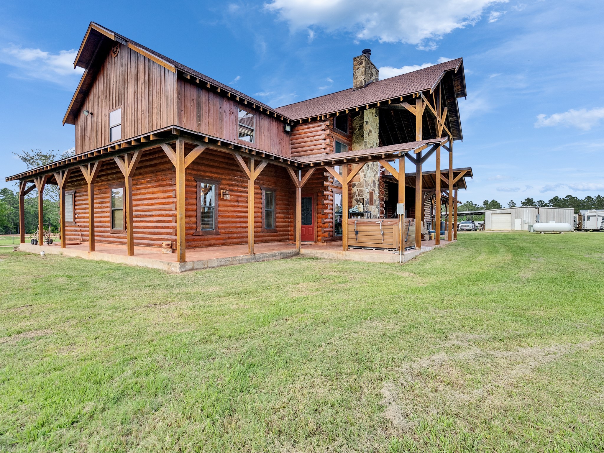 325 Forest Service 217 Road Shepherd, TX 77371 - Photo 12 of 46 front view of a house with a big yard
