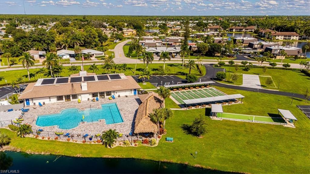 124 Versailles Circle Naples, FL 34112 - Photo 17 of 21 an aerial view of residential houses with outdoor space