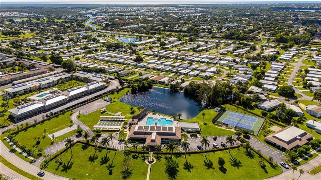 124 Versailles Circle Naples, FL 34112 - Photo 21 of 21 an aerial view of residential houses with outdoor space