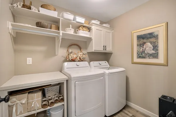 a spacious bedroom with a bed and window