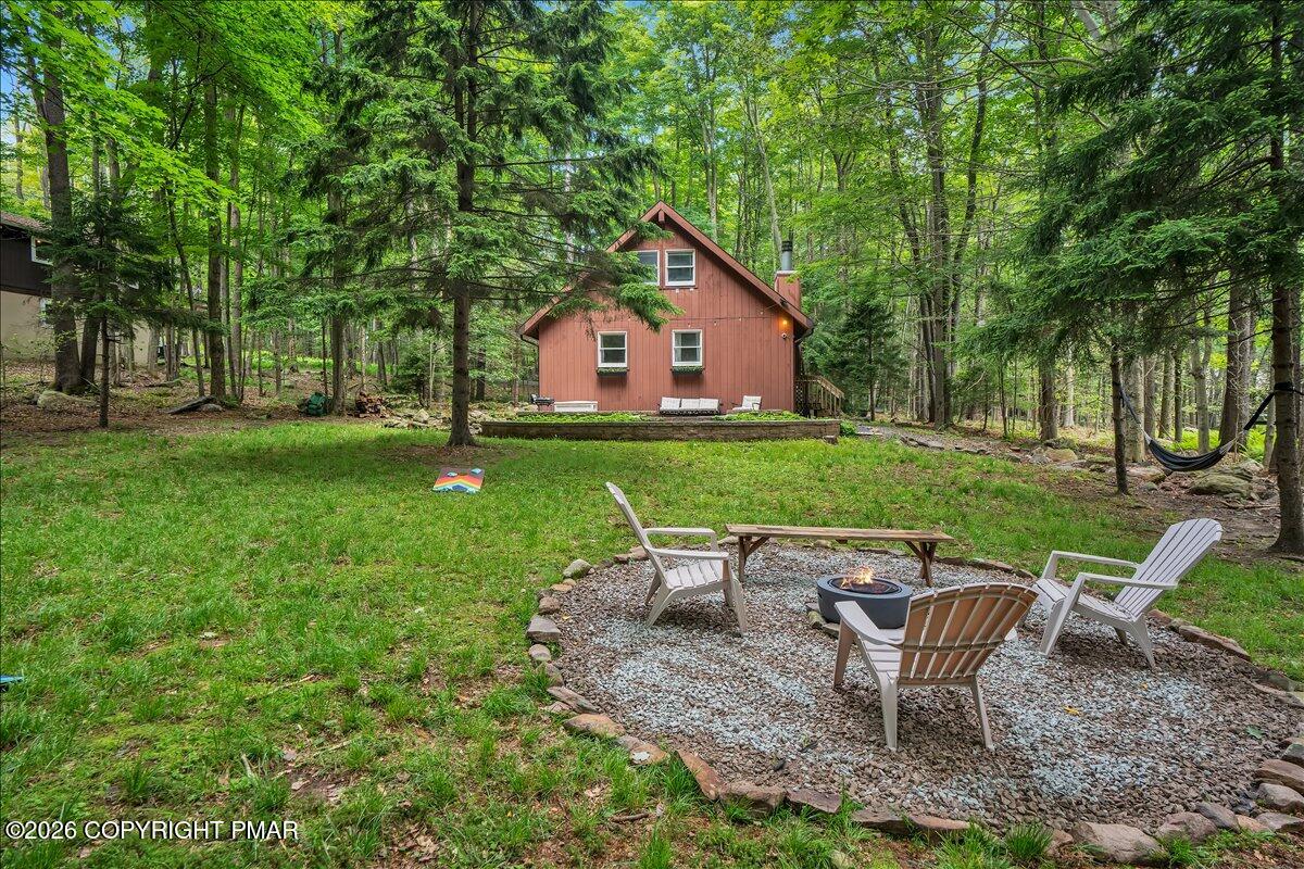 58 Sheffick Road, Unit E743 Gouldsboro, PA 18424 - Photo 26 of 44 a view of backyard of house with seating space
