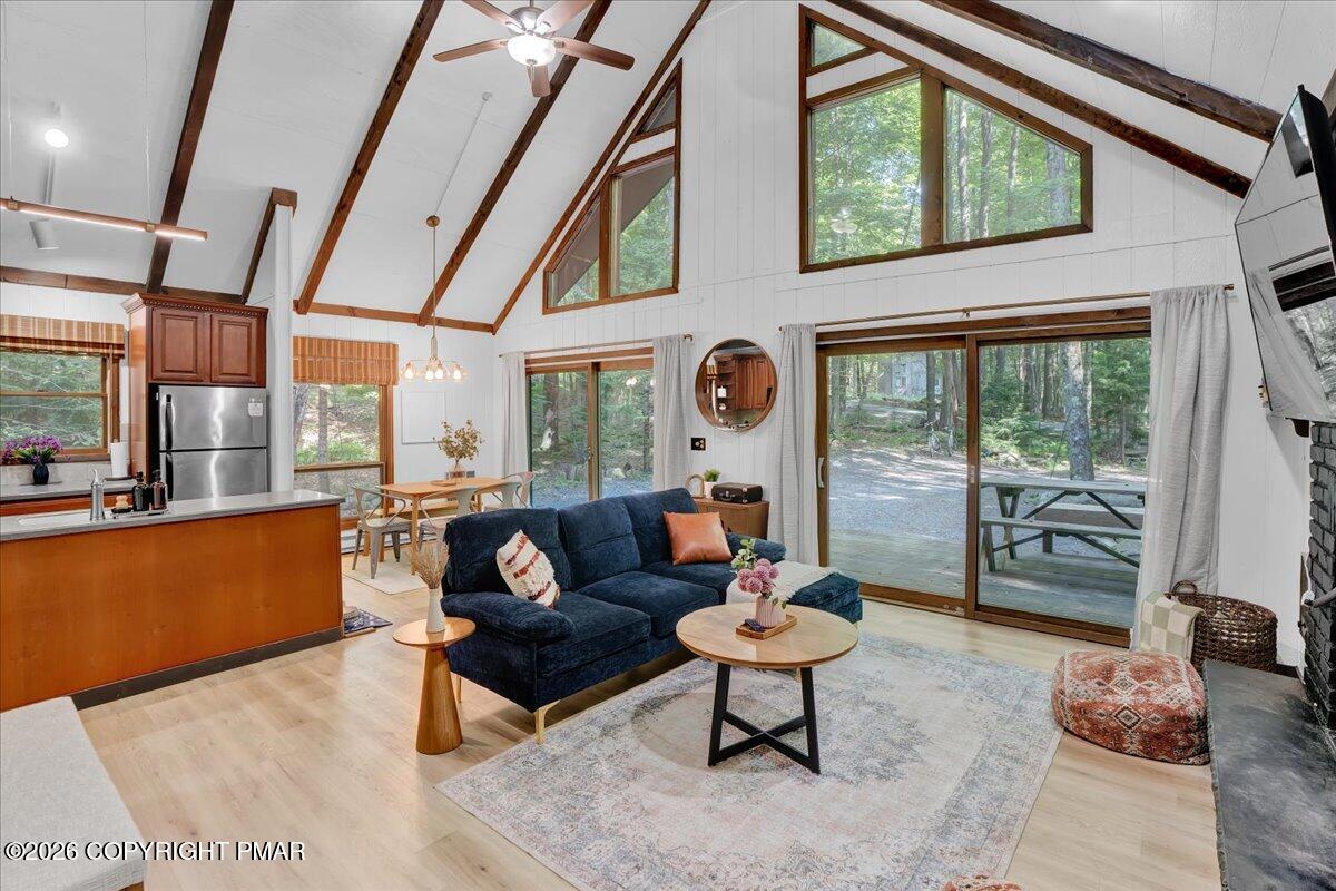 58 Sheffick Road, Unit E743 Gouldsboro, PA 18424 - Photo 3 of 44 a living room with furniture and a large window