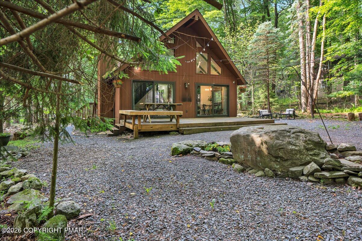 58 Sheffick Road, Unit E743 Gouldsboro, PA 18424 - Photo 31 of 44 a view of a house with backyard and sitting area