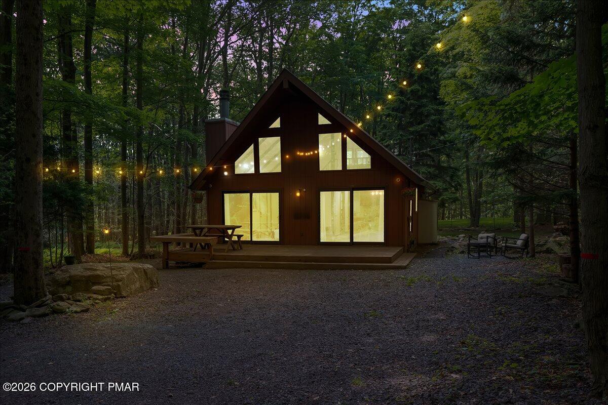 58 Sheffick Road, Unit E743 Gouldsboro, PA 18424 - Photo 39 of 44 a front view of a house with a yard