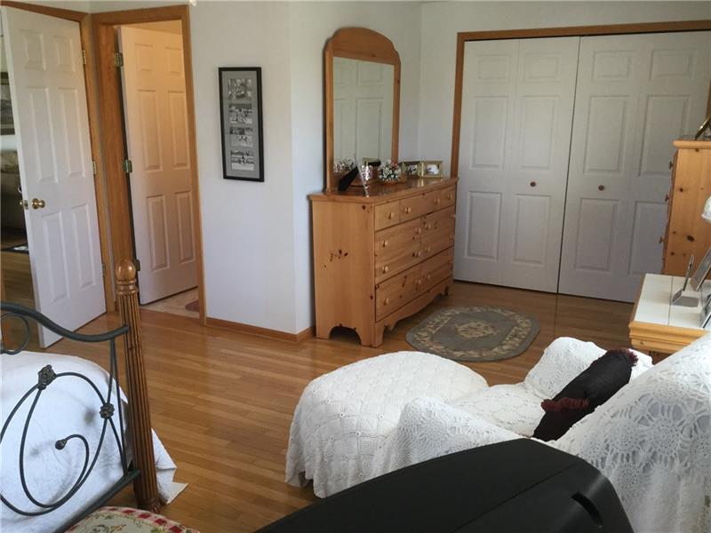 7557 Townline Road Transfer, PA 16154 - Photo 14 of 25 1st Level Master bedroom has an en suite bath and ample closet space.