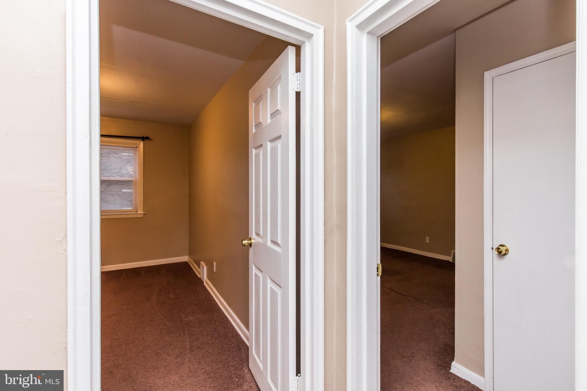 2757 East Country Club Road, Unit 2 Philadelphia, PA 19131 - Photo 14 of 24 a view of a hallway with a white walls