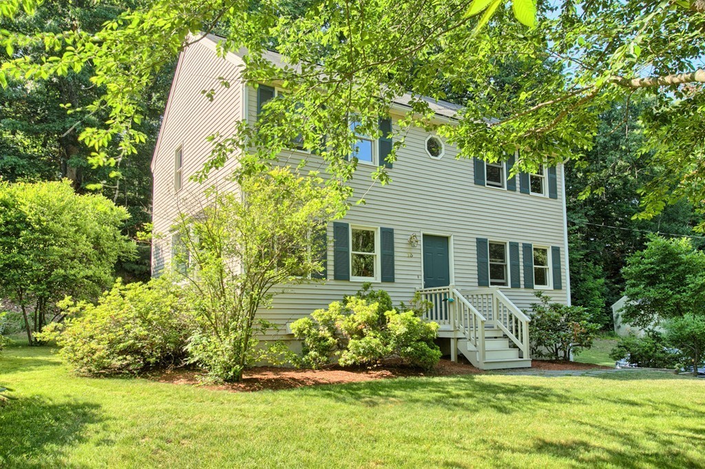 13 Valley Road Groton, MA 01450 - Photo 2 of 30 a front view of a house with a yard