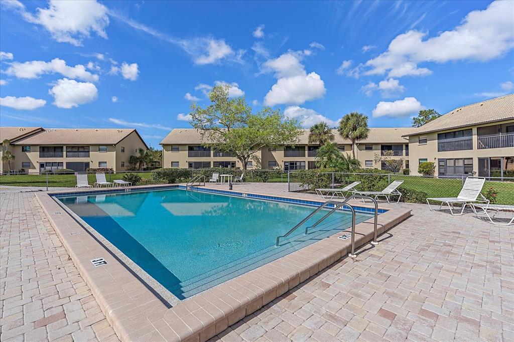 320 Mission Trail North, Unit B Venice, FL 34285 - Photo 23 of 25 a view of a patio with chairs and tables