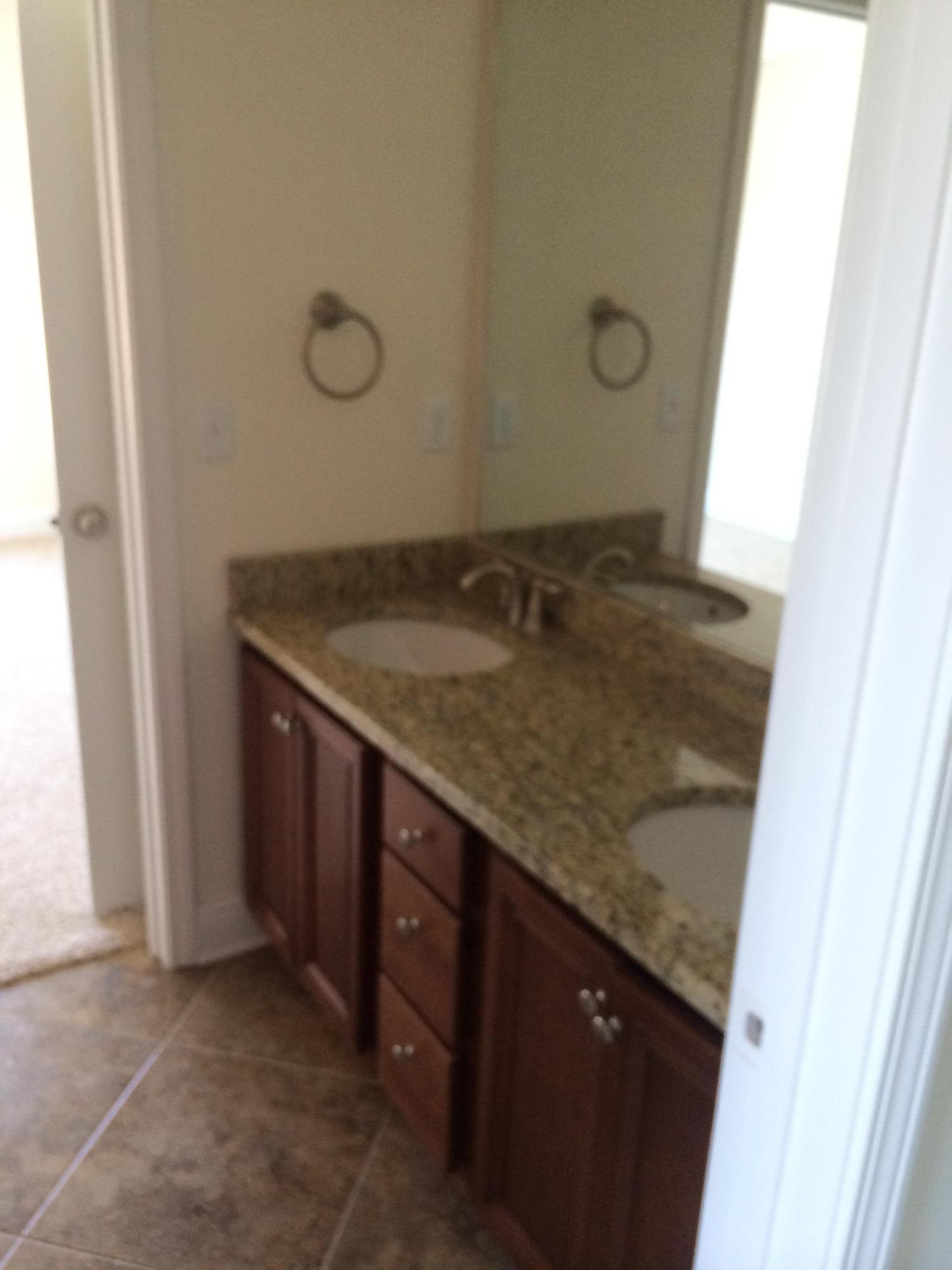 124 Pin Oak Loop Santa Rosa Beach, FL 32459 - Photo 17 of 19 a sink with a vanity