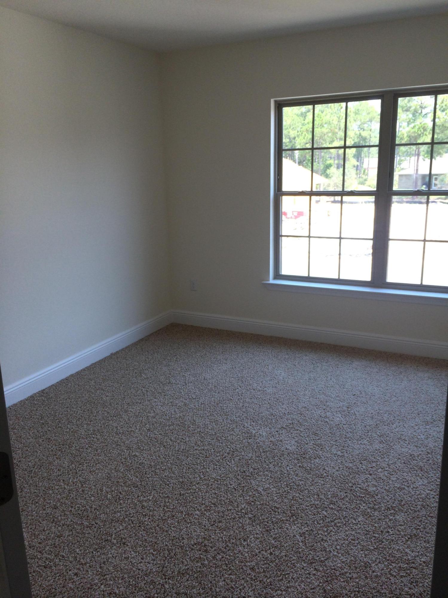 124 Pin Oak Loop Santa Rosa Beach, FL 32459 - Photo 18 of 19 an empty room with a window