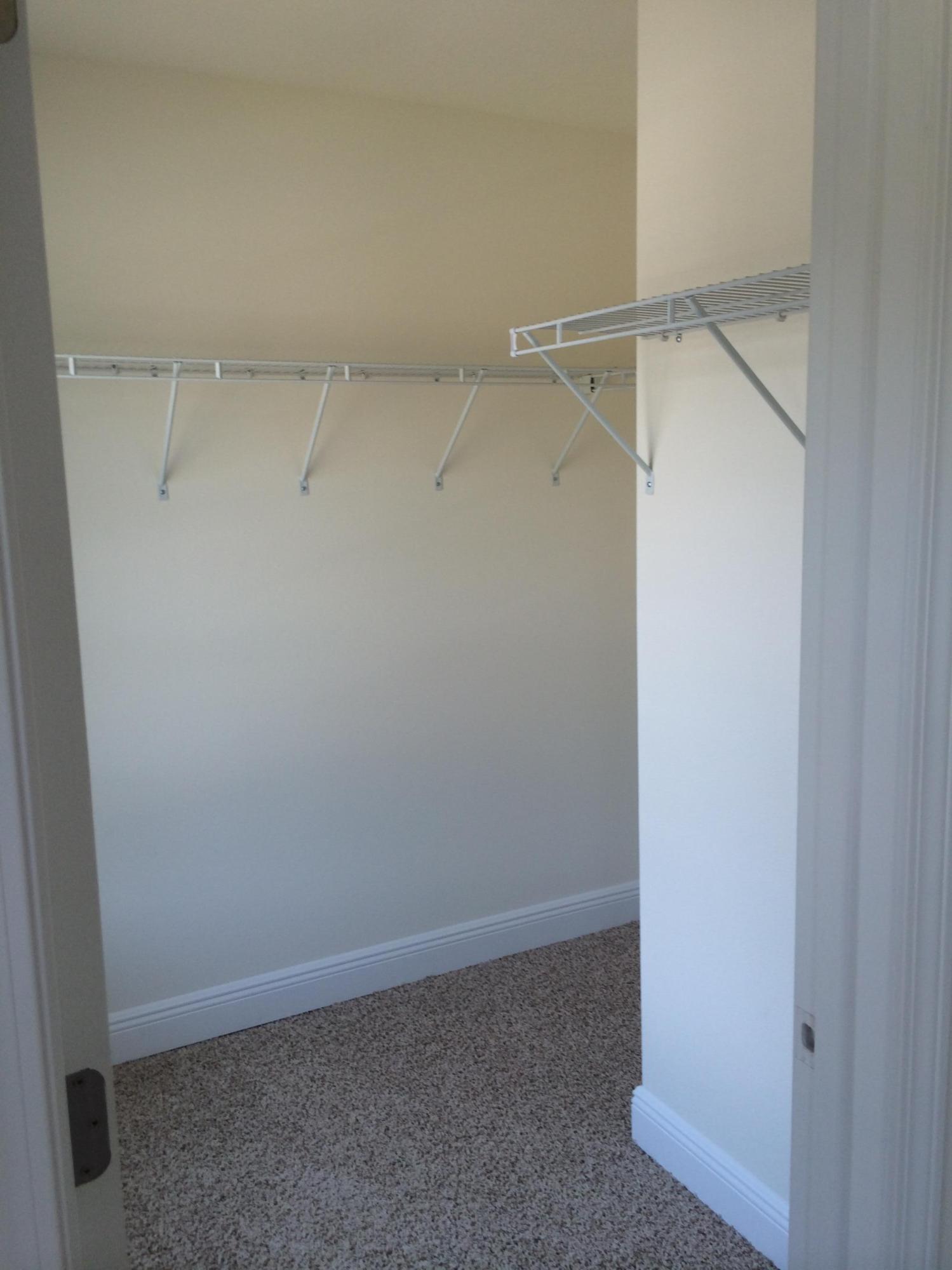 124 Pin Oak Loop Santa Rosa Beach, FL 32459 - Photo 19 of 19 a view of an empty walk in closet