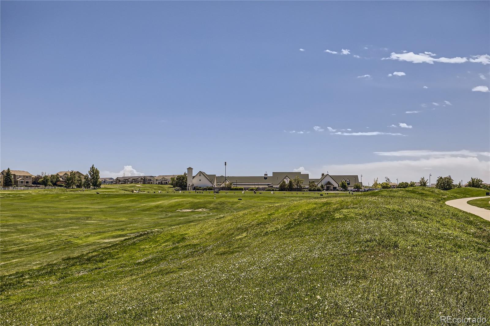1987 South Gold Bug Way Aurora, CO 80018 - Photo 14 of 18 a view of a big room with a big yard