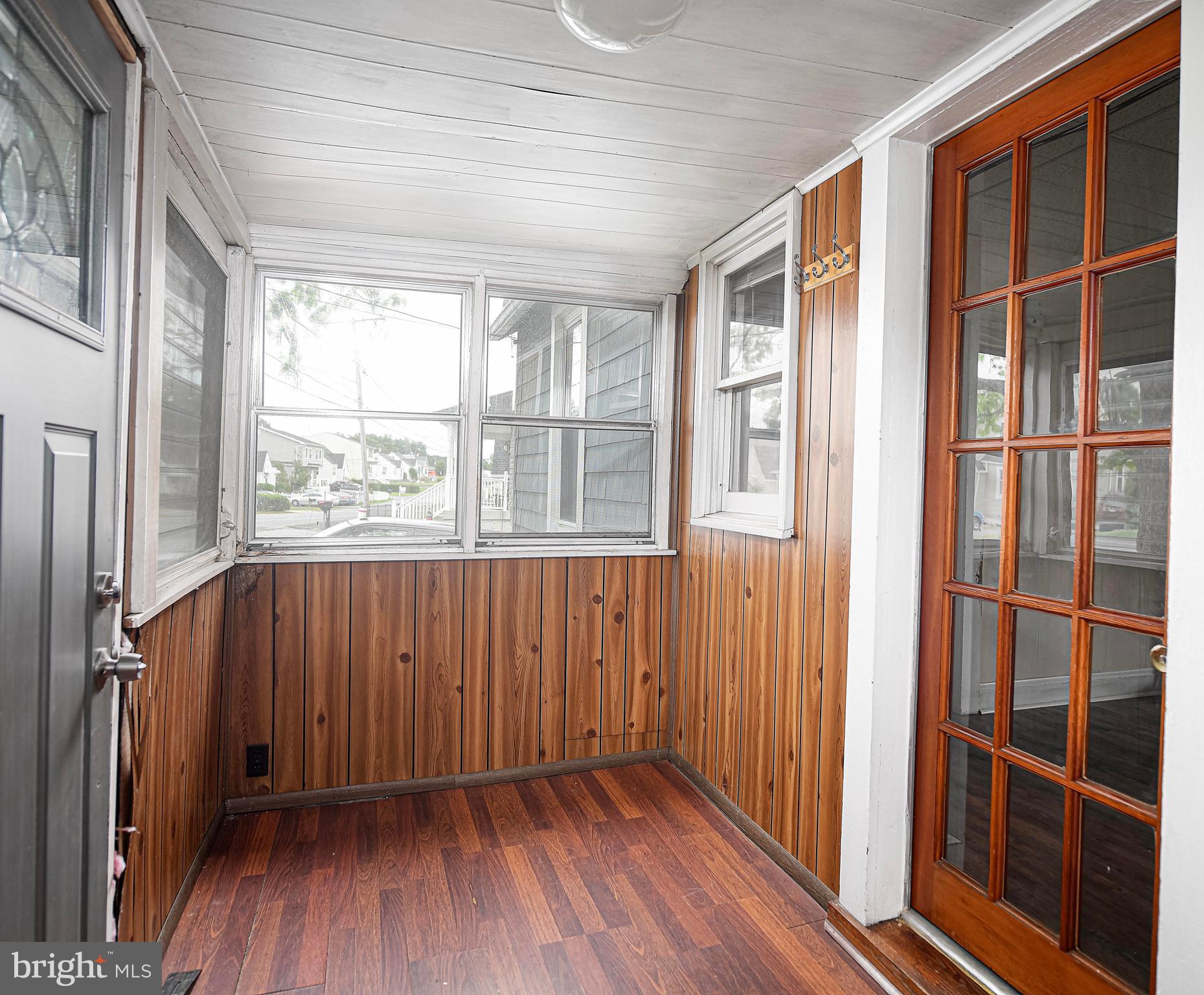 807 Wise Avenue Dundalk, MD 21222 - Photo 15 of 42 Sunroom leads to yard & water