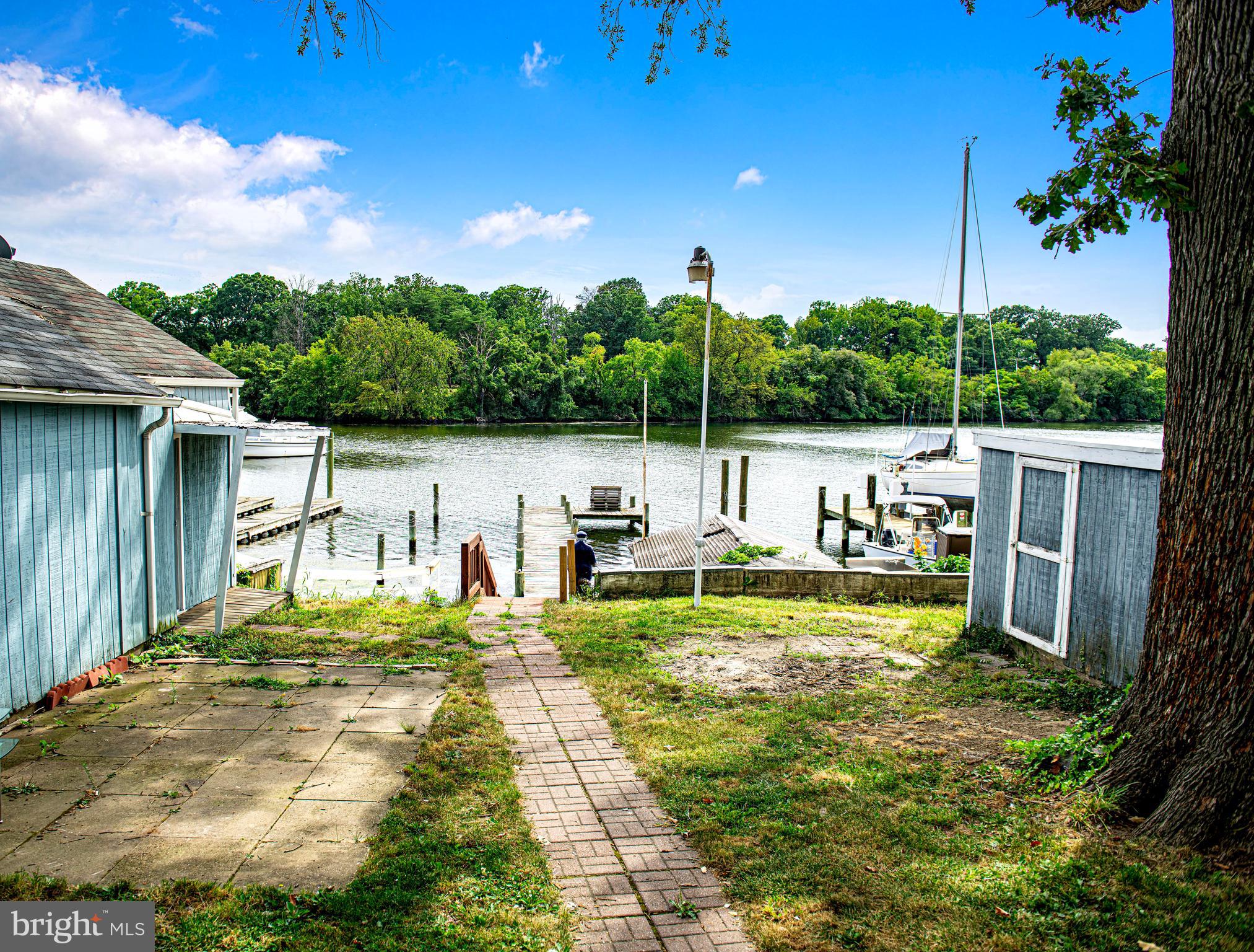 807 Wise Avenue Dundalk, MD 21222 - Photo 21 of 42 Paved walkway from house to the water