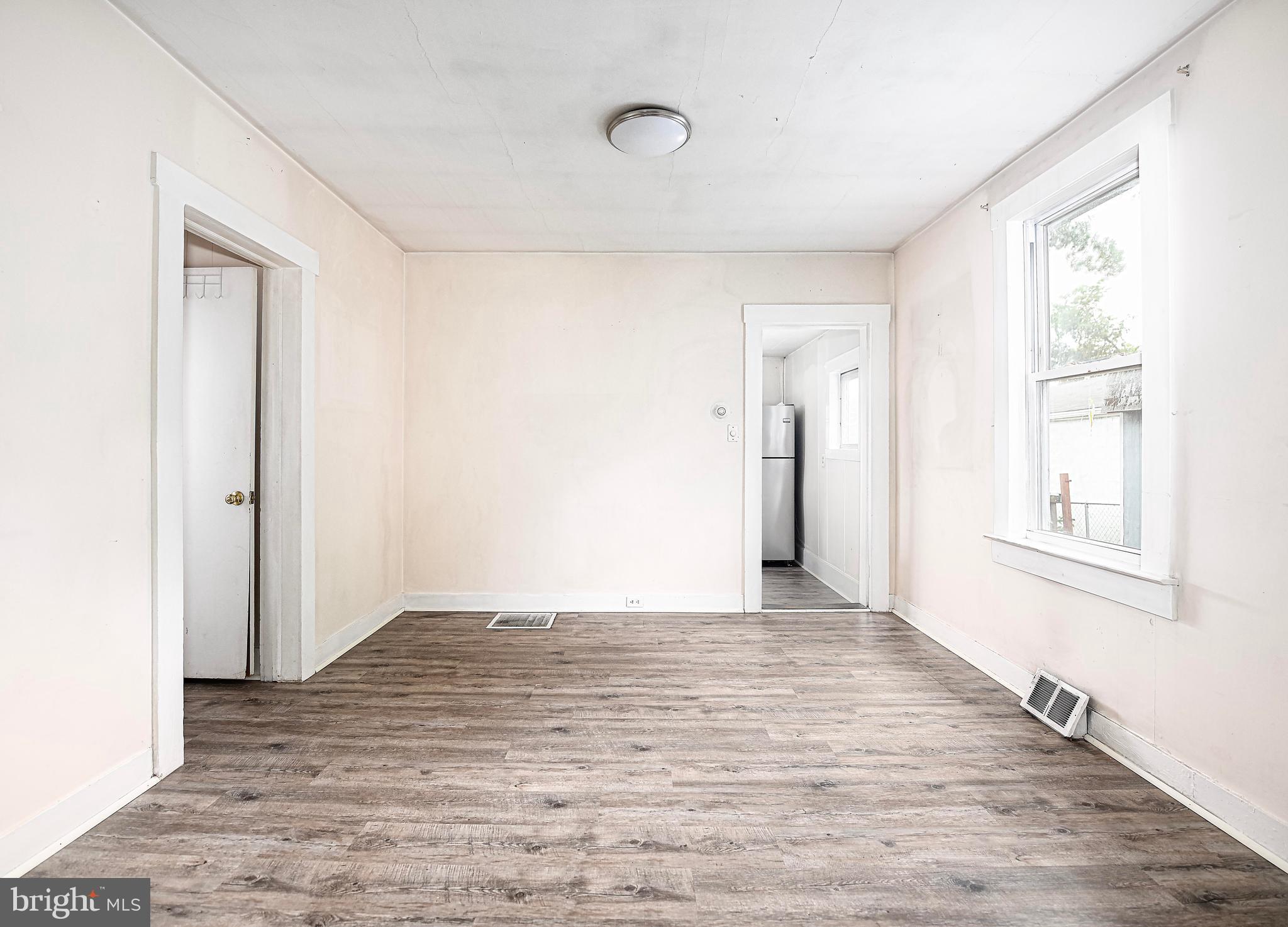 807 Wise Avenue Dundalk, MD 21222 - Photo 3 of 42 Living room looking into the kitchen