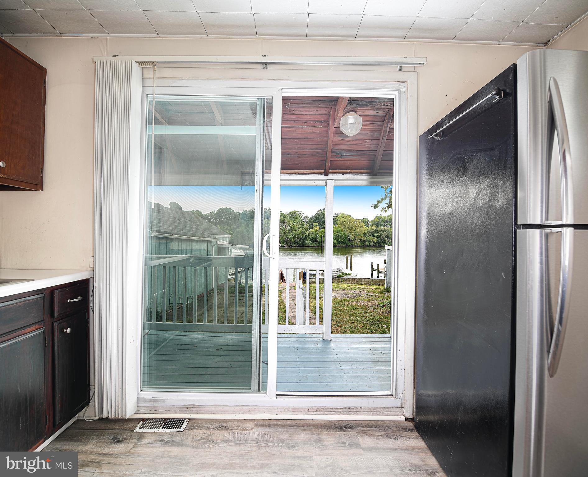807 Wise Avenue Dundalk, MD 21222 - Photo 8 of 42 Deck sits off of kitchen.
