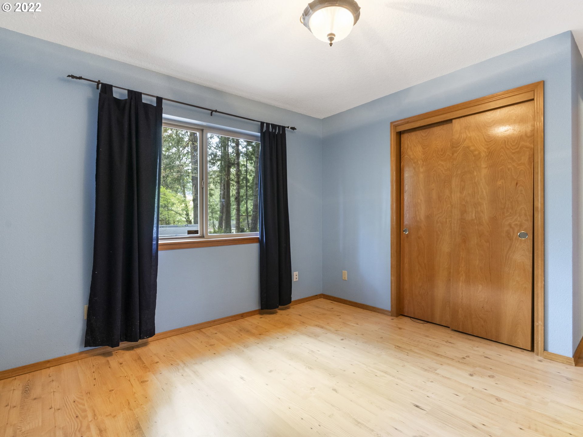 21676 East Lodge Lane Rhododendron, OR 97049 - Photo 19 of 32 a view of empty room with wooden floor