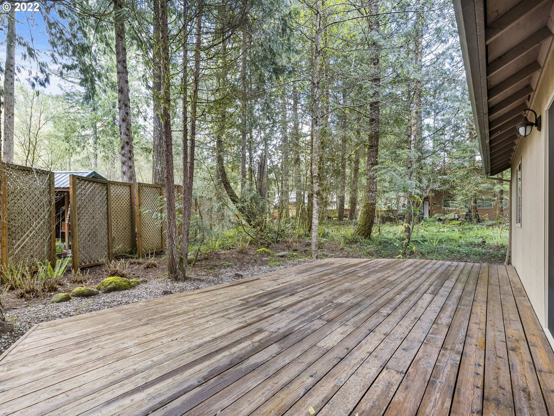 21676 East Lodge Lane Rhododendron, OR 97049 - Photo 25 of 32 a view of a backyard with wooden floor
