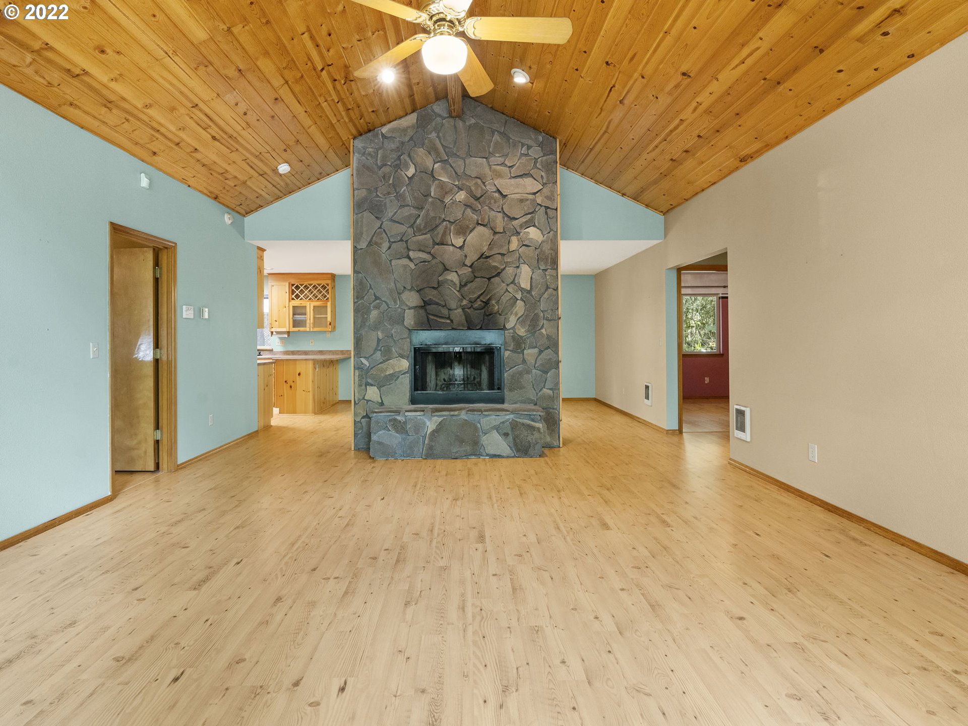 21676 East Lodge Lane Rhododendron, OR 97049 - Photo 6 of 32 a view of empty room with a fireplace