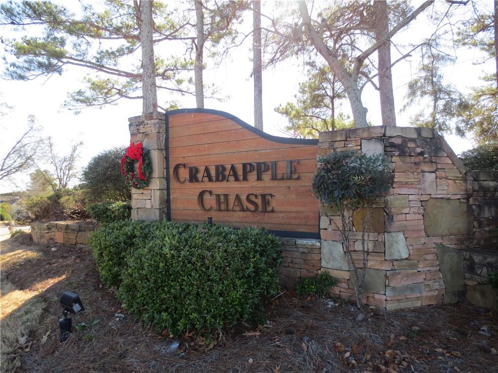 490 Sherman Oaks Way Alpharetta, GA 30004 - Photo 13 of 21 a sign on the side of a road