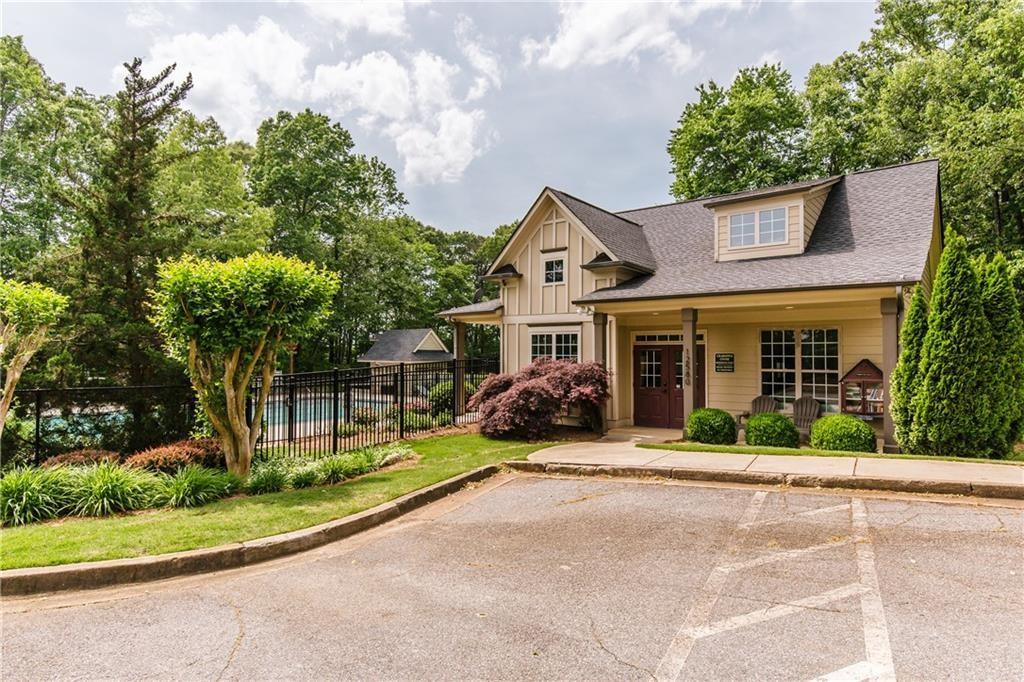 490 Sherman Oaks Way Alpharetta, GA 30004 - Photo 14 of 21 front view of a house with a patio