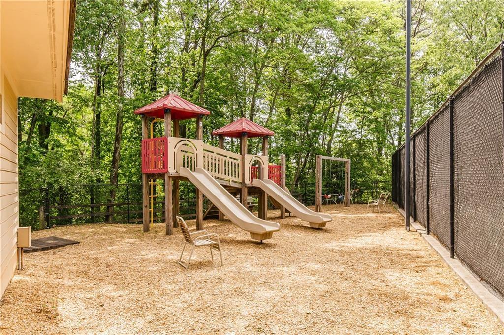 490 Sherman Oaks Way Alpharetta, GA 30004 - Photo 16 of 21 a view of a park with a slide