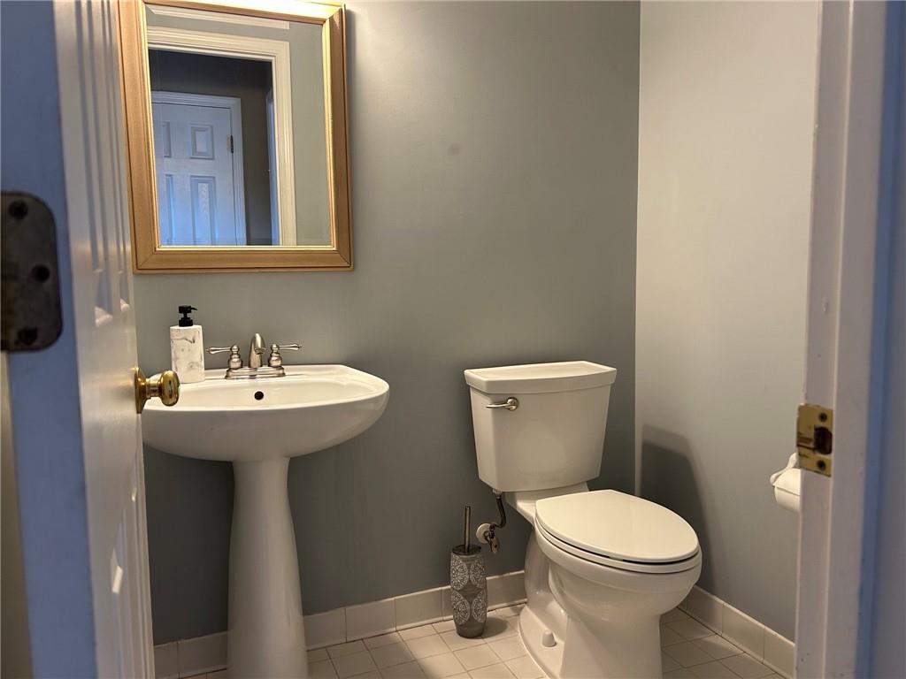 490 Sherman Oaks Way Alpharetta, GA 30004 - Photo 5 of 21 a bathroom with a sink toilet and mirror