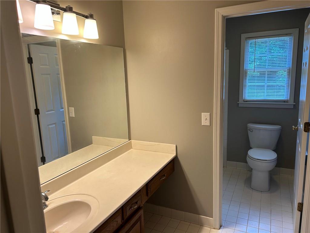 490 Sherman Oaks Way Alpharetta, GA 30004 - Photo 7 of 21 a bathroom with a sink toilet and shower
