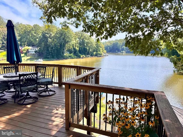 a view of a balcony with chairs