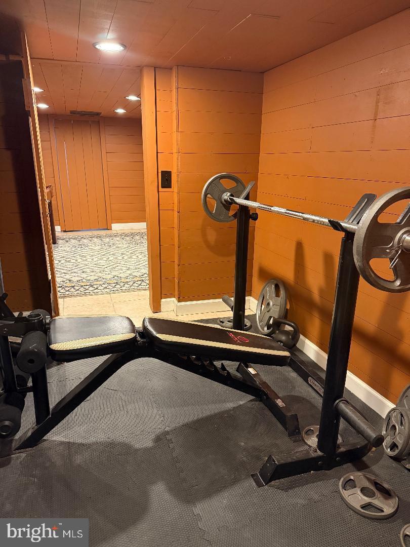 8389 Highview Street Manassas, VA 20112 - Photo 20 of 26 a view of a room with gym equipment