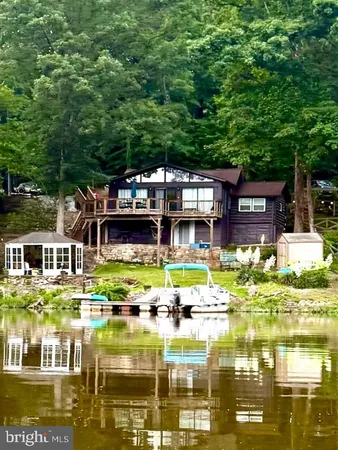 a front view of a building with lake view