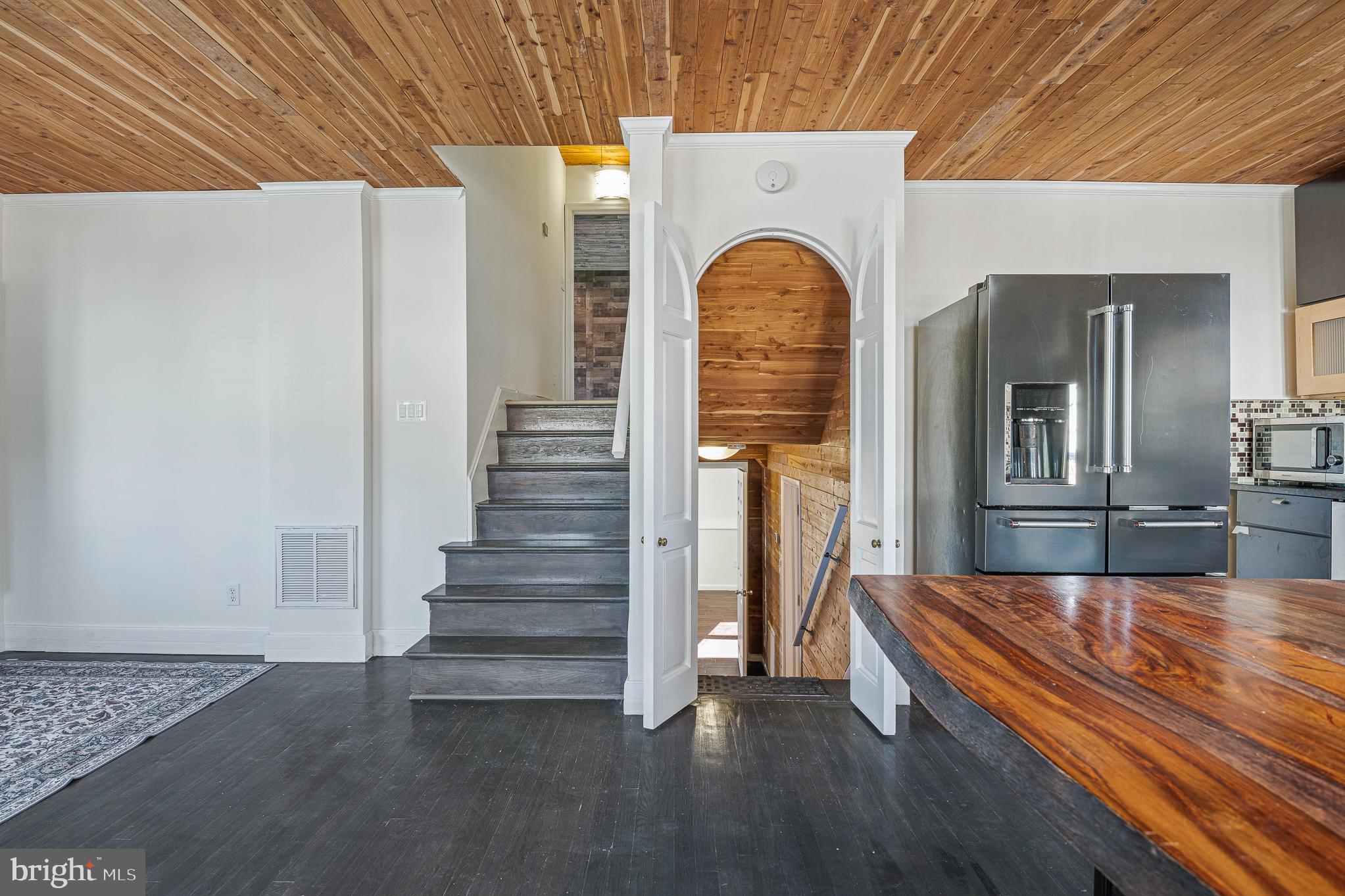 312 North Hammonds Ferry Road Linthicum Heights, MD 21090 - Photo 13 of 56 a view of entryway and hall with wooden floor