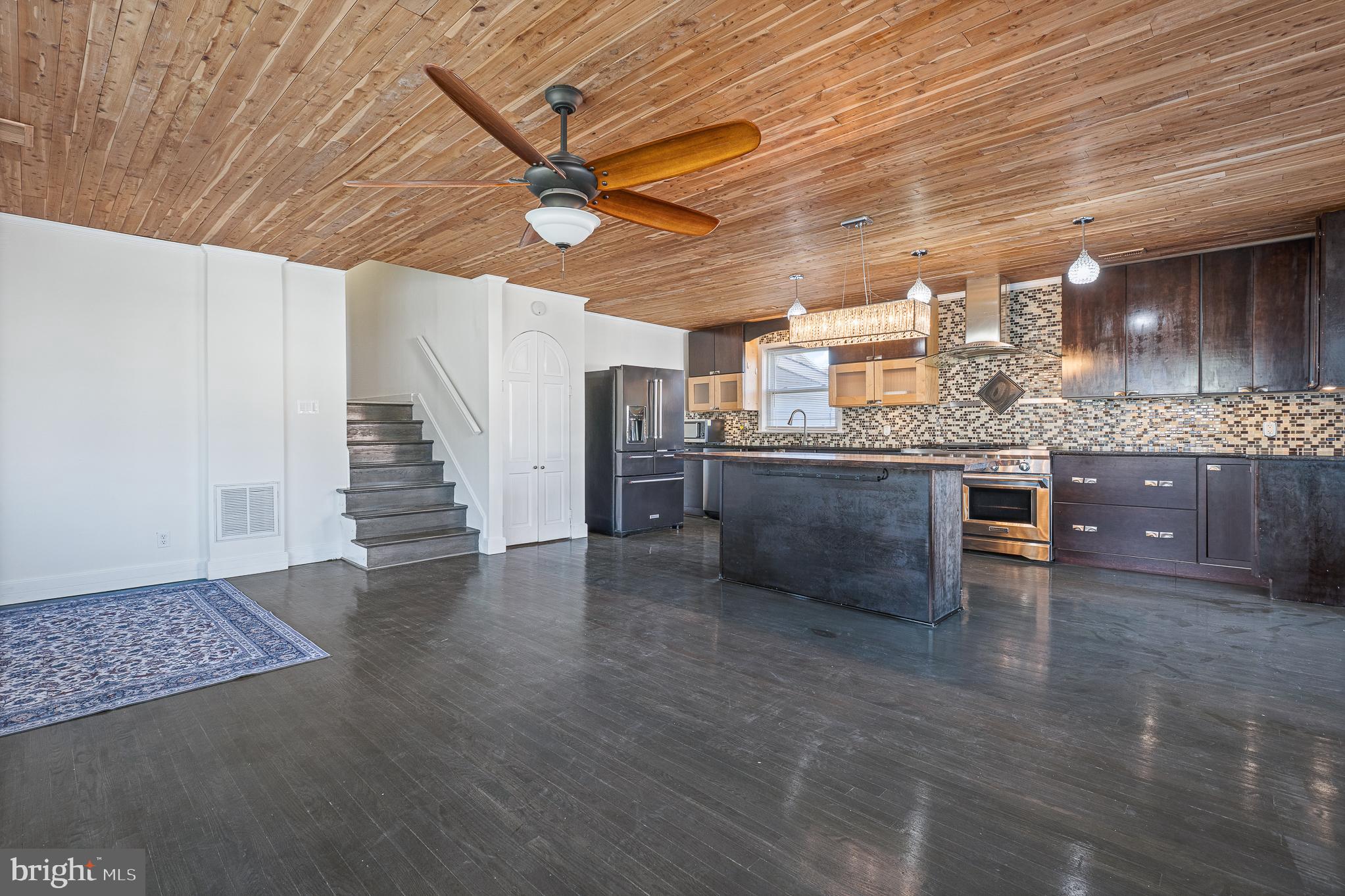 312 North Hammonds Ferry Road Linthicum Heights, MD 21090 - Photo 14 of 56 a view of a kitchen with a sink and a microwave